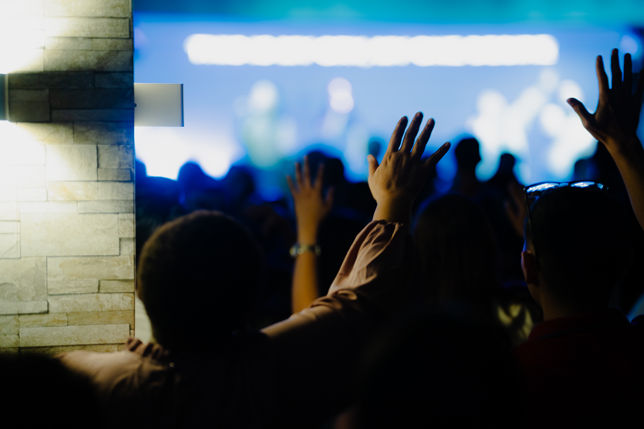 Worship gathering with stage lights
